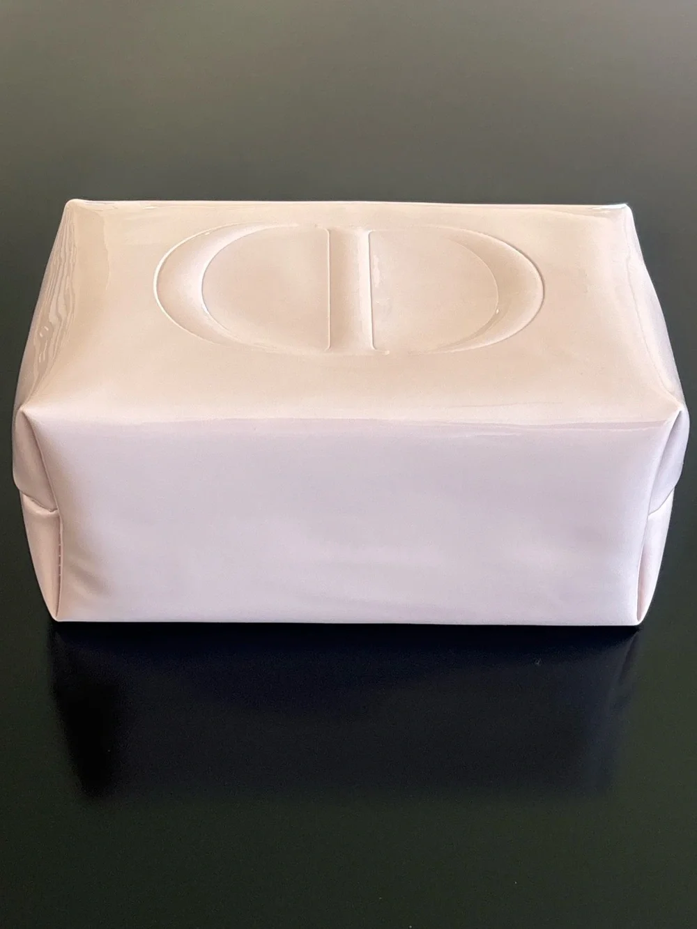 Dior beauty light pink glossy cosmetic bag with embossed CD logo